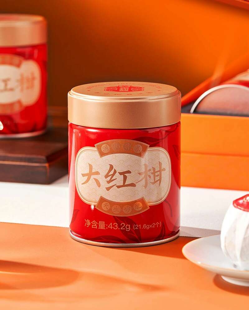 柑馨甜饴,茶醇润养 大益 大红柑润养茶礼上新 brand_alt_mark